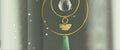 Vertical gold geometric suncatcher with three tiered hoops, a faceted crystal sphere, and two green Aventurine stones casting a galaxy of rainbows on a white wall.