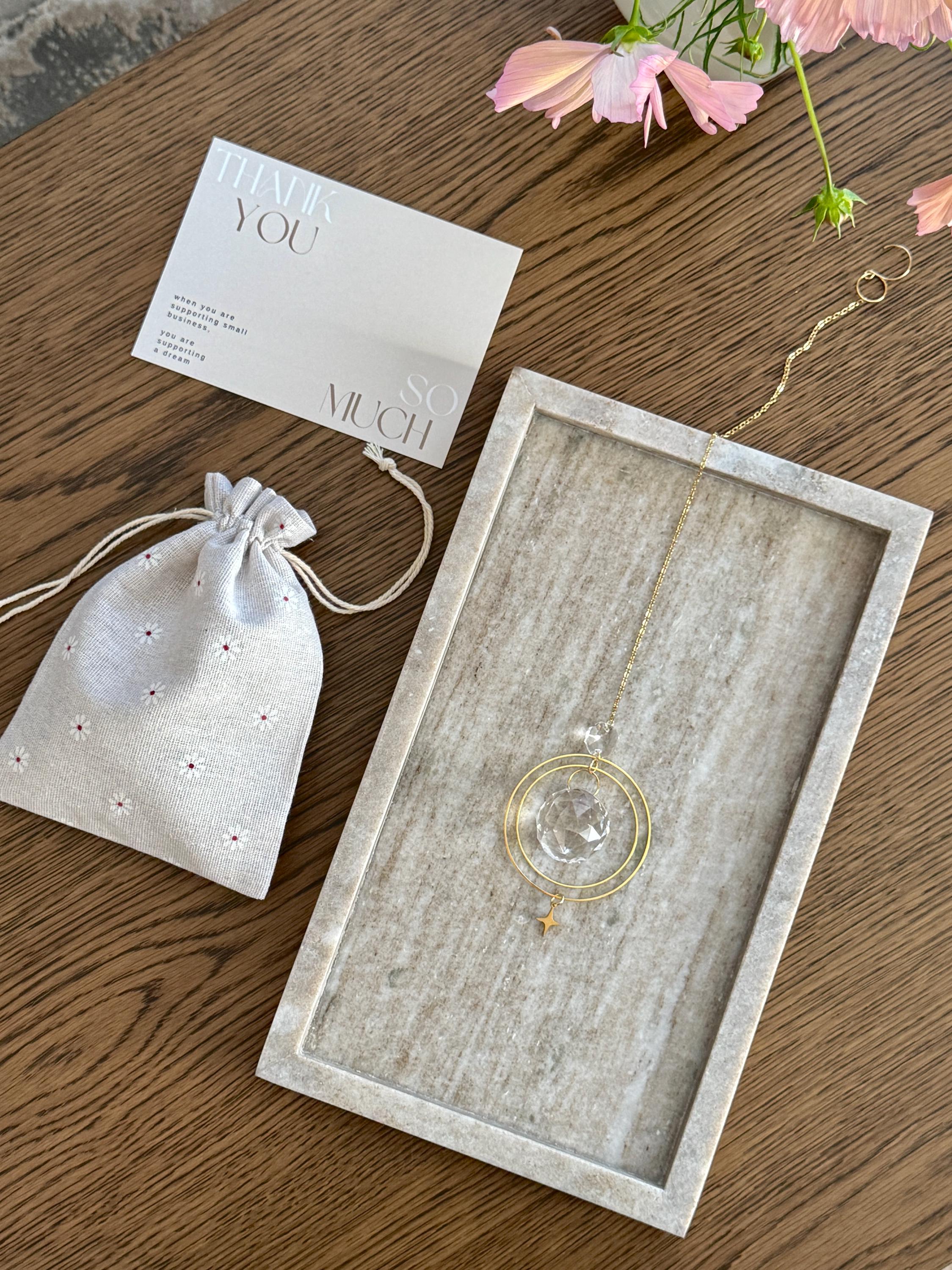 The "North Star Prism" celestial suncatcher with elegant linen gift pouch - perfect celestial gift idea (Geschenkidee).